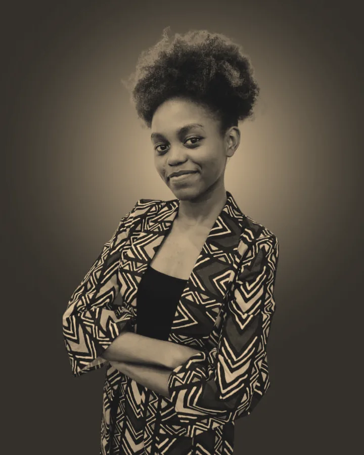 Professional studio portrait of Michelle Mugo