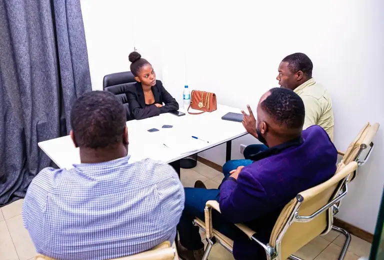 Michelle Mugo in a professional strategy meeting